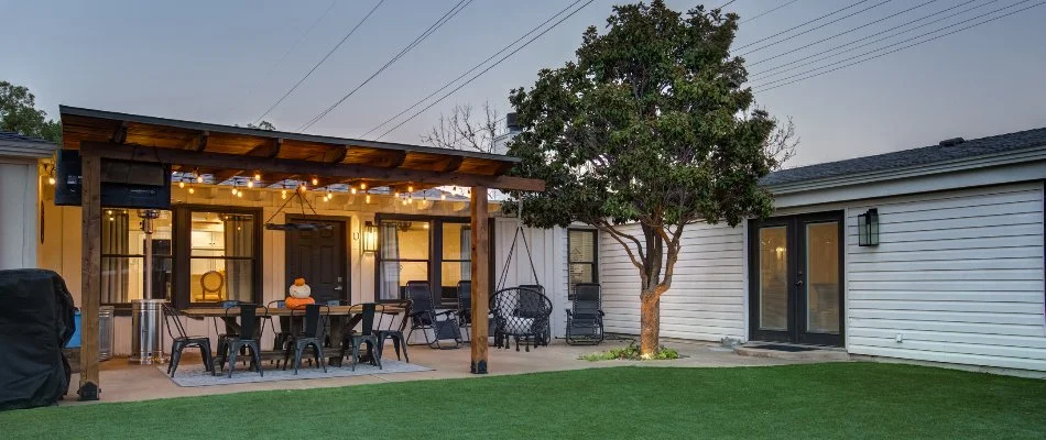 Pergola and artificial grass in a backyard near Plainview, TX.