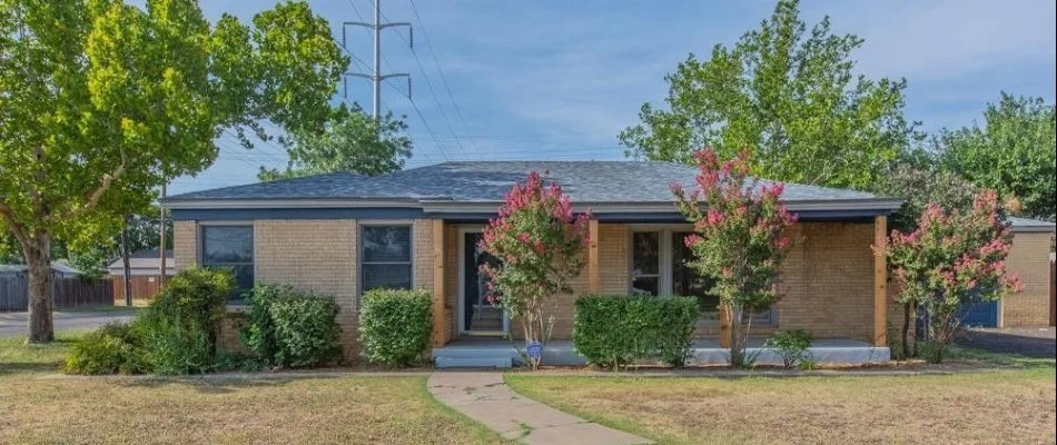 Trees and shrubs outside a house in Crosbyton, TX.